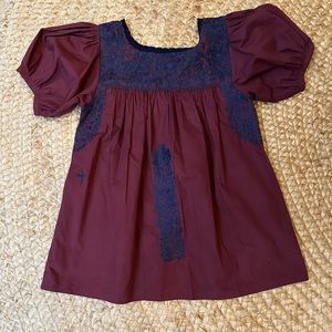 Mi Golondrina Carolina top. Burgundy with navy embroidery.